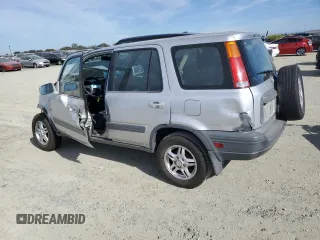 2000 Honda CR-V EX with VIN JHLRD1863YC002722, listed as a Copart auction lot 77416684 with 260,216 mi miles and Salvage Title. Bid and sale history available at carsss.com. Image 2.