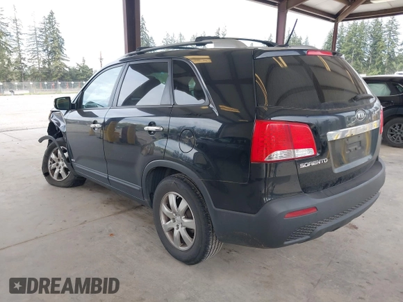 2011 Kia Sorento LX with VIN 5XYKTDA24BG170561, listed as a IAAI auction lot 42011756 with 211,833 mi miles. Bid and sale history available at carsss.com. Image 3.