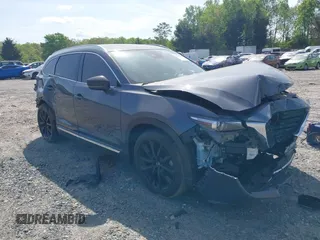 2022 Mazda CX-9 Grand Touring with VIN JM3TCBDY8N0628886, listed as a IAAI auction lot 42074044 with 67,867 mi miles and . Bid and sale history available at DreamBid. Image 1.