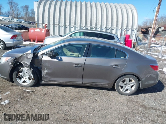 2011 Buick LaCrosse CX z VIN 1G4GA5ED7BF287630, wystawiony jako IAAI lot #41585309 z przebiegiem 132 872 mil mil oraz . Historia ofert i sprzedaży dostępna na DreamBid. Obrazek 14.