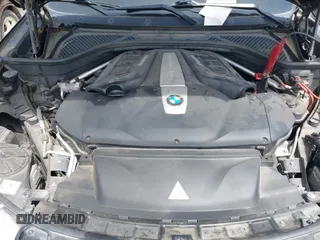 2014 BMW X5 xDrive50i with VIN 5UXKR6C55E0C03743, listed as a IAAI auction lot 42268302 with 118,892 mi miles and . Bid and sale history available at DreamBid. Image 10.