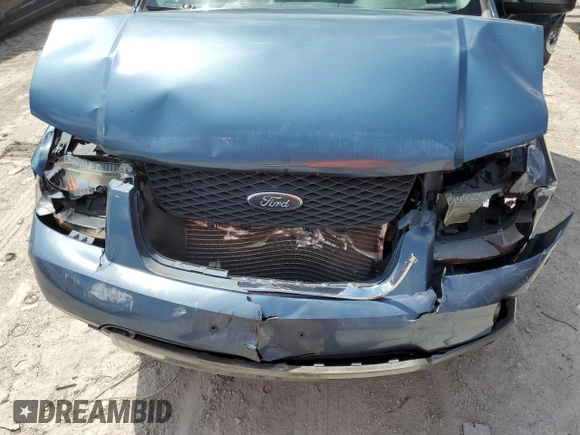 2005 Ford Freestyle SEL z VIN 1FMDK021X5GA25385, wystawiony jako Copart lot #72239954 z przebiegiem 161 219 mil mil oraz Szkoda całkowita • Salvage title. Historia ofert i sprzedaży dostępna na DreamBid. Obrazek 12.
