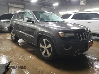 2015 Jeep Grand Cherokee Overland with VIN 1C4RJFCT2FC613502, listed as a Copart auction lot 89207005 with 124,482 mi miles and Salvage Title. Bid and sale history available at carsss.com. Image 4.