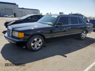 1990 Mercedes-Benz 420 with VIN WDBCA35E6LA549912, listed as a Copart auction lot 69108464 with 302,188 mi miles and Salvage Title. Bid and sale history available at carsss.com. Image 1.
