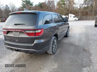 2015 Dodge Durango SXT with VIN 1C4RDJAG4FC784865, listed as a IAAI auction lot 40872452 with 145,877 mi miles and . Bid and sale history available at carsss.com. Image 4.