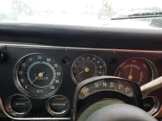 1971 Chevrolet Suburban z VIN CE261Z640706, wystawiony jako Copart lot #87385634 z przebiegiem 818 477 mil mil oraz Czysty tytuł • Clean title. Historia ofert i sprzedaży dostępna na DreamBid. Obrazek 9.