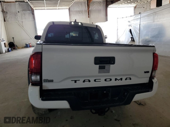 2018 Toyota Tacoma SR z VIN 3TMCZ5AN7JM178223, wystawiony jako Copart lot #49588605 z przebiegiem 179 064 mil mil oraz Szkoda całkowita • Salvage title. Historia ofert i sprzedaży dostępna na DreamBid. Obrazek 6.