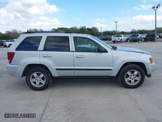 2007 Jeep Grand Cherokee Laredo with VIN 1J8GS48K17C507013, listed as a IAAI auction lot 41702347 with 178,119 mi miles. Bid and sale history available at carsss.com. Image 13.