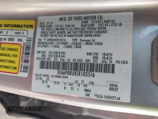 2014 Ford Fusion Titanium Hybrid with VIN 3FA6P0RUXER103516, listed as a IAAI auction lot 42004602 with 128,287 mi miles and . Bid and sale history available at carsss.com. Image 9.