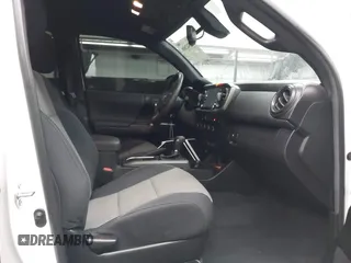 2022 Toyota Tacoma SR with VIN 3TMCZ5AN5NM480311, listed as a IAAI auction lot 42542600 with 43,297 mi miles and . Bid and sale history available at DreamBid. Image 5.