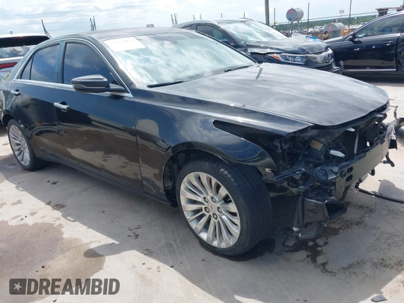 2014 Cadillac CTS Vsport RWD z VIN 1G6AU5S84E0149790, wystawiony jako IAAI lot #42369928 z przebiegiem 96 715 mil mil oraz . Historia ofert i sprzedaży dostępna na DreamBid. Obrazek 1.