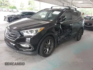 2018 Hyundai Santa Fe Ultimate z VIN 5NMZW4LA6JH054308, wystawiony jako IAAI lot #42385503 z przebiegiem 108 004 mil mil oraz . Historia ofert i sprzedaży dostępna na DreamBid. Obrazek 17.