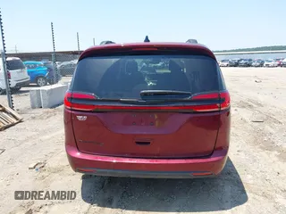 2023 Chrysler Pacifica Touring L with VIN 2C4RC1BG7PR513017, listed as a IAAI auction lot 42441272 with 23,310 mi miles and . Bid and sale history available at DreamBid. Image 16.