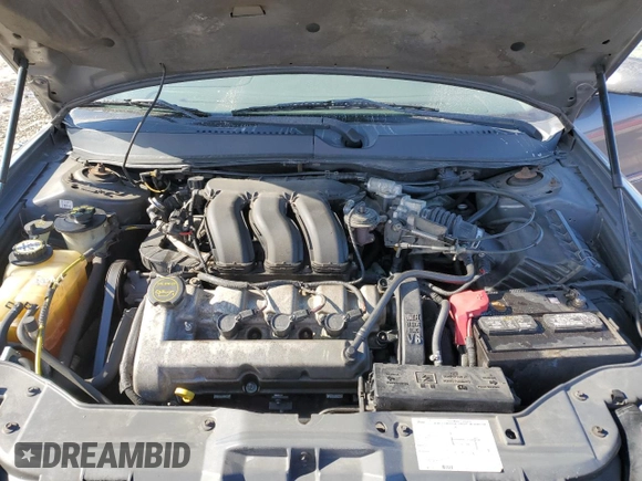 2005 Mercury Sable LS z VIN 1MEFM55S45A617102, wystawiony jako Copart lot #41788115 z przebiegiem 131 668 mil mil oraz Szkoda całkowita • Salvage title. Historia ofert i sprzedaży dostępna na DreamBid. Obrazek 11.