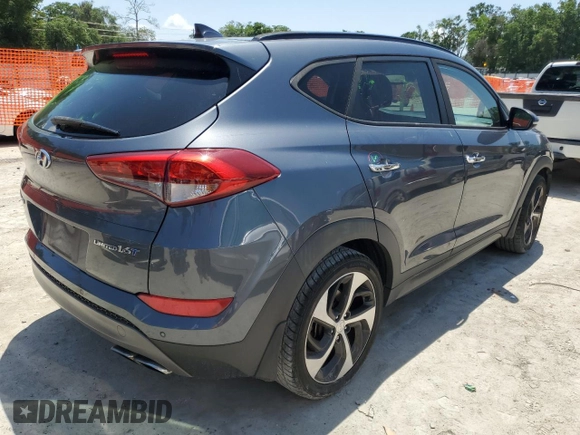 2016 Hyundai Tucson Limited with VIN KM8J33A22GU209297, listed as a Copart auction lot 54689985 with 108,674 mi miles and Salvage Title. Bid and sale history available at DreamBid. Image 3.