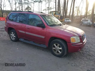 2002 GMC Envoy SLT with VIN 1GKDT13S022449220, listed as a IAAI auction lot 41630354 with 346,603 mi miles. Bid and sale history available at carsss.com. Image 1.