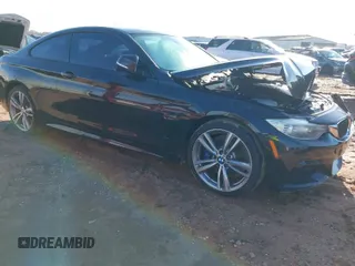 2014 BMW 4 Series 435i xDrive with VIN WBA3R5C5XEK186453, listed as a IAAI auction lot 41417704 with 150,533 mi miles. Bid and sale history available at carsss.com. Image 1.