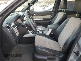 2010 Mercury Mariner Premier with VIN 4M2CN9HG6AKJ00320, listed as a Copart auction lot 77432934 with 201,699 mi miles and Salvage Title. Bid and sale history available at carsss.com. Image 7.