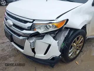 2013 Ford Edge SEL with VIN 2FMDK3J93DBB16822, listed as a IAAI auction lot 41995178 with 242,376 mi miles. Bid and sale history available at carsss.com. Image 6.
