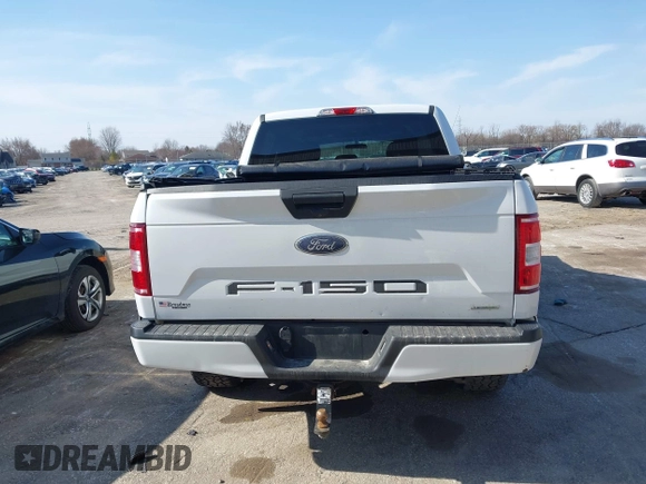 2018 Ford F-150 XL with VIN 1FTEW1EP9JKF26133, listed as a IAAI auction lot 42062779 with 119,518 mi miles. Bid and sale history available at carsss.com. Image 16.