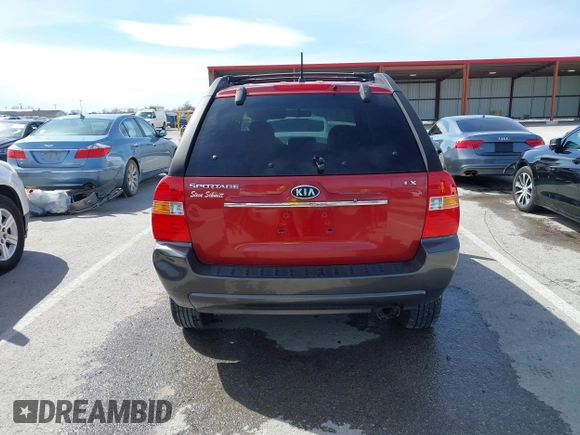 2007 Kia Sportage LX with VIN KNDJF724577371572, listed as a IAAI auction lot 41817960 with 213,062 mi miles. Bid and sale history available at carsss.com. Image 16.