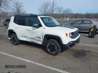 2015 Jeep Renegade Trailhawk with VIN ZACCJBCT6FPB32422, listed as a IAAI auction lot 41618410 with 42,219 mi miles and . Bid and sale history available at DreamBid. Image 1.