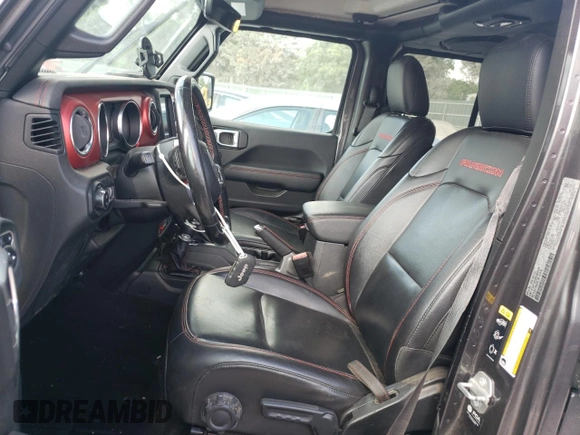 2021 Jeep Gladiator Rubicon with VIN 1C6JJTBG3ML602478, listed as a Copart auction lot 58138705 with 76,759 mi miles and Salvage title. Bid and sale history available at DreamBid. Image 7.