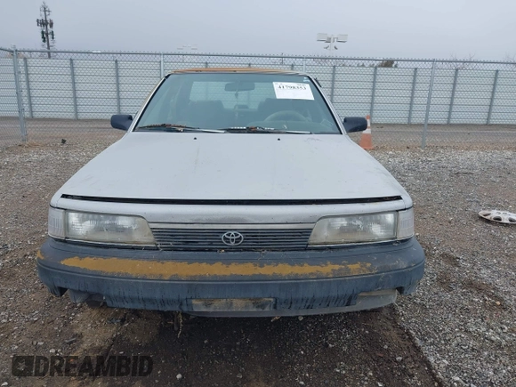 1990 Toyota Camry DLX z VIN 4T1SV21EXLU271320, wystawiony jako IAAI lot #41798353 z przebiegiem 269 178 mil mil oraz . Historia ofert i sprzedaży dostępna na DreamBid. Obrazek 6.