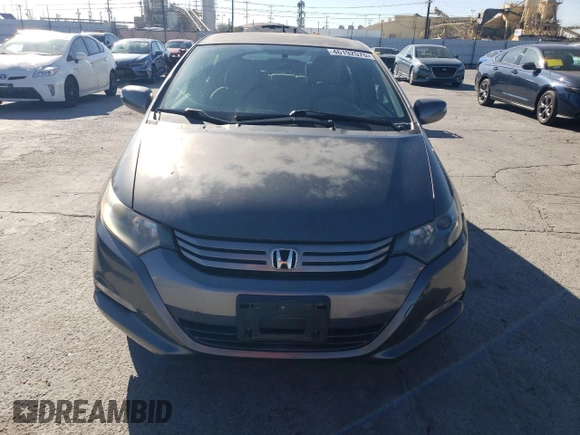 2010 Honda Insight EX with VIN JHMZE2H73AS039935, listed as a Copart auction lot 46192575 with 127,329 mi miles and Salvage Title. Bid and sale history available at DreamBid. Image 5.