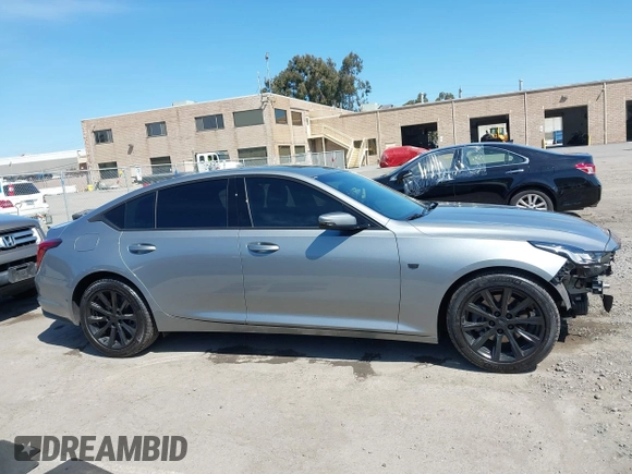 2023 Cadillac CT5 Luxury z VIN 1G6DW5RK7P0146345, wystawiony jako IAAI lot #41862152 z przebiegiem 18 902 mil mil oraz . Historia ofert i sprzedaży dostępna na DreamBid. Obrazek 14.
