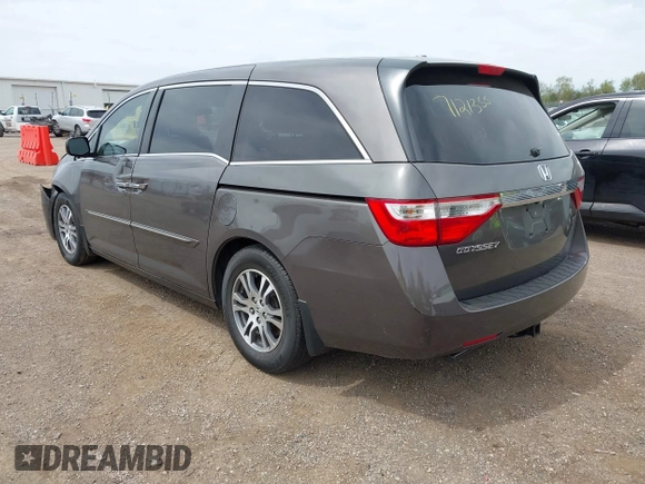 2011 Honda Odyssey EX-L with VIN 5FNRL5H68BB100274, listed as a IAAI auction lot 42159787 with 205,616 mi miles and . Bid and sale history available at carsss.com. Image 3.