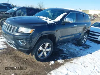 2015 Jeep Grand Cherokee Overland z VIN 1C4RJFCG3FC726748, wystawiony jako IAAI lot #41369715 z przebiegiem 120 905 mil mil oraz . Historia ofert i sprzedaży dostępna na DreamBid. Obrazek 2.