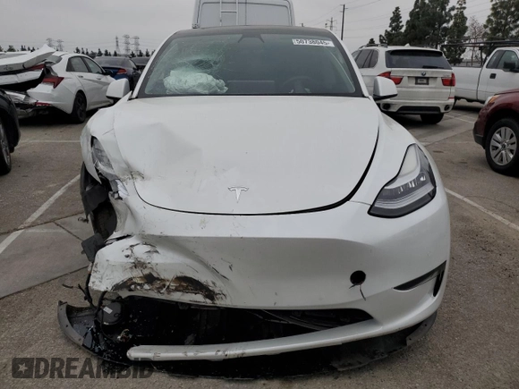 2021 Tesla Model Y Long Range with VIN 5YJYGDEE3MF214823, listed as a Copart auction lot 50738045 with 63,227 mi miles and Salvage Title. Bid and sale history available at DreamBid. Image 5.