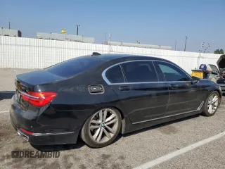 2016 BMW 7 Series 740i with VIN WBA7E2C59GG547804, listed as a Copart auction lot 68620463 with 122,937 mi miles. Bid and sale history available at carsss.com. Image 3.