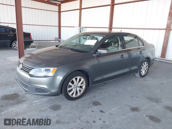 2013 Volkswagen Jetta SE z VIN 3VWDX7AJ3DM254962, wystawiony jako IAAI lot #41753707 z przebiegiem 125 225 mil mil oraz . Historia ofert i sprzedaży dostępna na DreamBid. Obrazek 2.