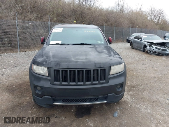 2013 Jeep Grand Cherokee Laredo with VIN 1C4RJEAG2DC573970, listed as a IAAI auction lot 41892914 with 185,050 mi miles. Bid and sale history available at carsss.com. Image 12.