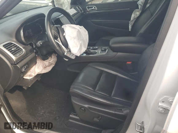 2021 Jeep Grand Cherokee 80th Anniversary with VIN 1C4RJFBG7MC535316, listed as a Copart auction lot 52822995 with 50,793 mi miles and Salvage Title. Bid and sale history available at DreamBid. Image 7.