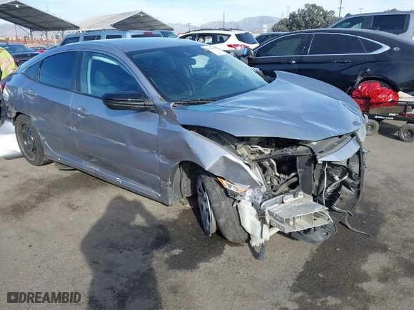 2019 Honda Civic Sedan LX with VIN 19XFC2F67KE203650, listed as a IAAI auction lot 41372503 with 128,034 mi miles. Bid and sale history available at carsss.com. Image 1.