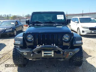 2020 Jeep Wrangler Unlimited Sport S z VIN 1C4HJXDN9LW323205, wystawiony jako IAAI lot #41879292 z przebiegiem 108 499 mil mil oraz . Historia ofert i sprzedaży dostępna na DreamBid. Obrazek 12.