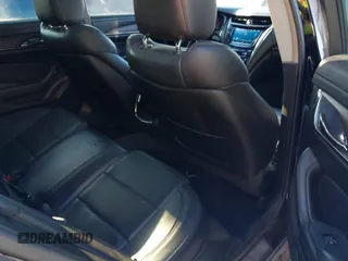 2017 Cadillac CTS Luxury AWD z VIN 1G6AX5SX7H0176310, wystawiony jako IAAI lot #41293373 z przebiegiem 161 264 mil mil oraz . Historia ofert i sprzedaży dostępna na DreamBid. Obrazek 8.