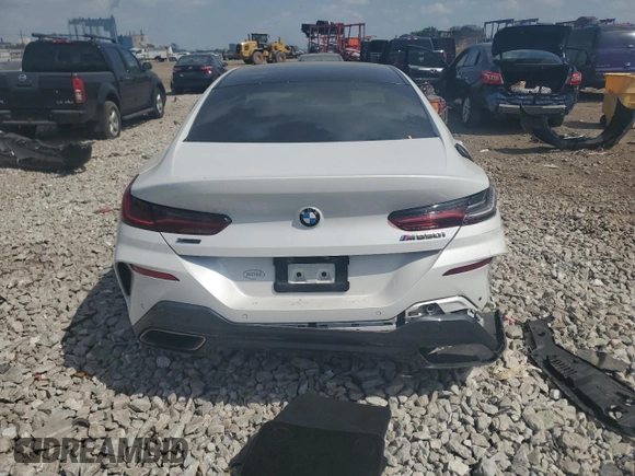 2020 BMW 8 Series M850i z VIN WBAGV8C06LBP48932, wystawiony jako Copart lot #57165015 z przebiegiem 55 731 mil mil oraz Szkoda całkowita • Salvage title. Historia ofert i sprzedaży dostępna na DreamBid. Obrazek 6.