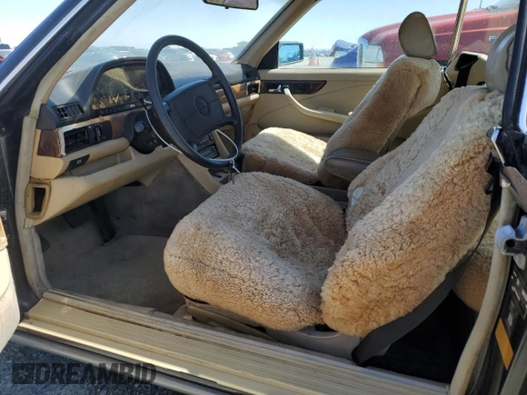 1987 Mercedes-Benz 560 with VIN WDBCA45D3HA358923, listed as a Copart auction lot 52143895 with 127,974 mi miles and Clean Title. Bid and sale history available at DreamBid. Image 8.