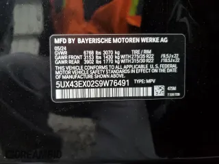 2025 BMW X6 M60i with VIN 5UX43EX02S9W76491, listed as a Copart auction lot 85033264 with 5,173 mi miles and Salvage Title. Bid and sale history available at carsss.com. Image 15.