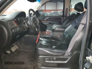 2010 Chevrolet Suburban LTZ with VIN 1GNUKKE38AR283830, listed as a Copart auction lot 84887104 with 298,548 mi miles and Salvage Title. Bid and sale history available at carsss.com. Image 7.