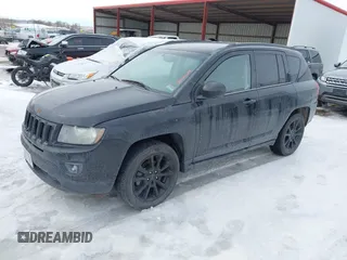 2014 Jeep Compass Sport with VIN 1C4NJCBA0ED680136, listed as a IAAI auction lot 41620604 with Not Provided miles. Bid and sale history available at carsss.com. Image 2.