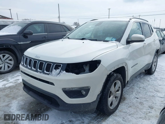 2019 Jeep Compass Latitude with VIN 3C4NJDBB0KT813014, listed as a IAAI auction lot 41560221 with 63,307 mi miles. Bid and sale history available at carsss.com. Image 22.