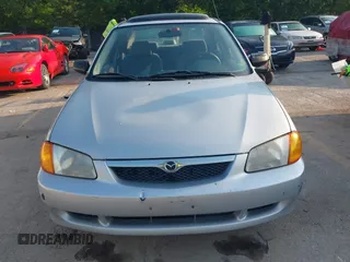 1999 Mazda Protege ES z VIN JM1BJ2212X0194256, wystawiony jako IAAI lot #42452060 z przebiegiem 208 002 mil mil oraz . Historia ofert i sprzedaży dostępna na DreamBid. Obrazek 6.