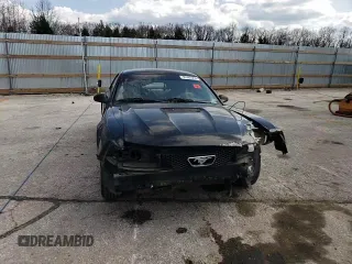 2001 Ford Mustang Standard z VIN 1FAFP40431F148521, wystawiony jako Copart lot #50789955 z przebiegiem 119 356 mil mil oraz Szkoda całkowita • Salvage title. Historia ofert i sprzedaży dostępna na DreamBid. Obrazek 10.