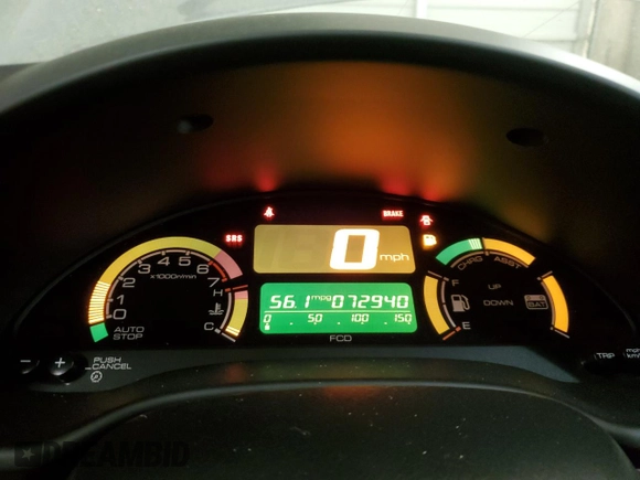 2000 Honda Insight with VIN JHMZE1376YT000164, listed as a Copart auction lot 53851695 with 72,940 mi miles and Salvage title. Bid and sale history available at DreamBid. Image 9.