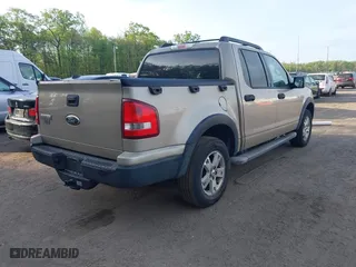 2007 Ford Explorer Sport Trac XLT with VIN 1FMEU31K17UA03709, listed as a IAAI auction lot 42113395 with 213,203 mi miles. Bid and sale history available at carsss.com. Image 4.